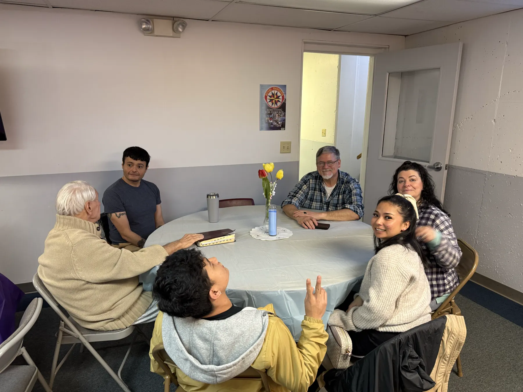Allegan Assembly community gathered in conversation